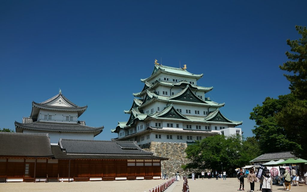 Nagoya Castle standing tall against a clear blue sky