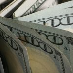 Close-up of US hundred-dollar bills fanned out