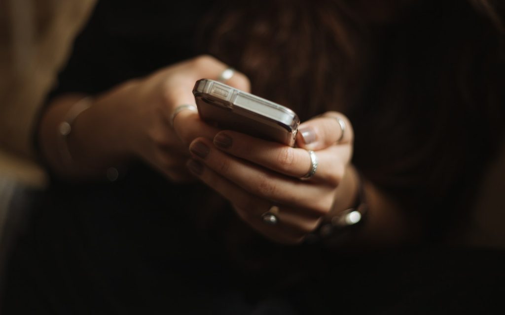 Person reading on a smartphone